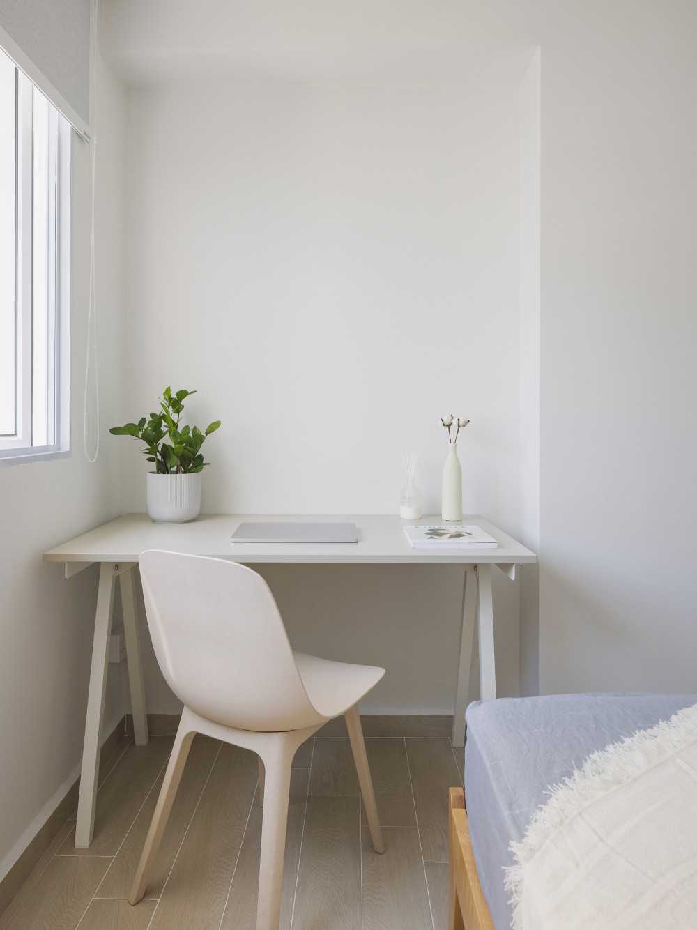 Scandinavian Bedroom with Wood Flooring and Roller Blinds