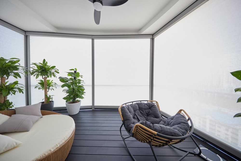 Modern Balcony with Window Grille and Outdoor Chairs