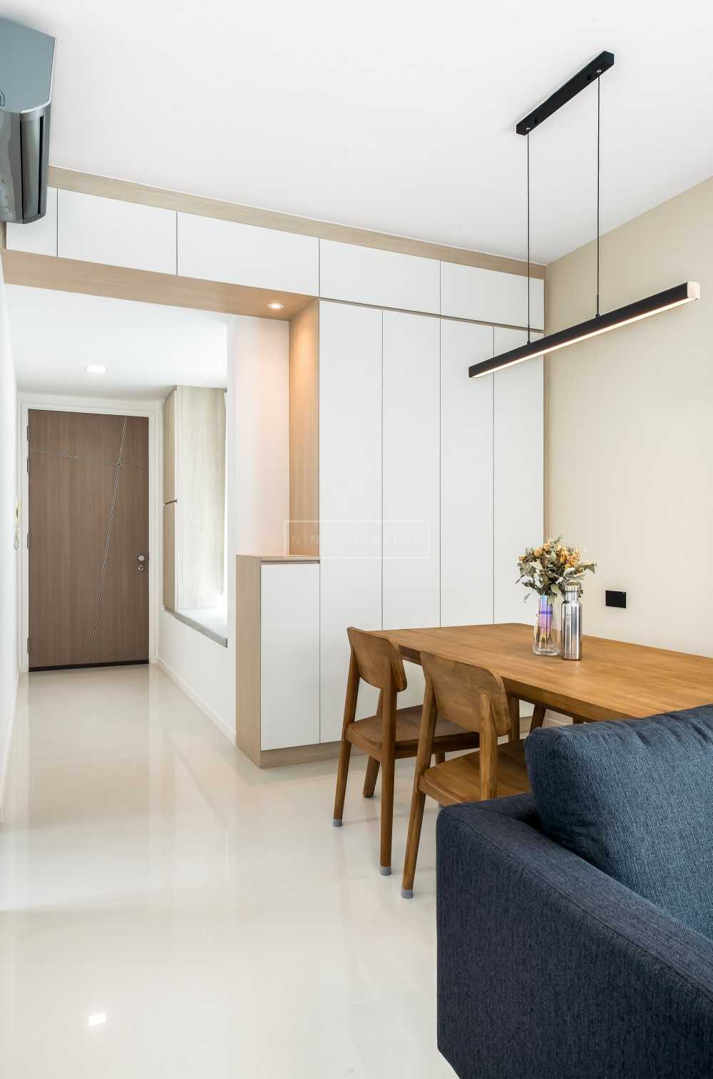 Minimalist Dining Room with Ceiling Light and Dining Table