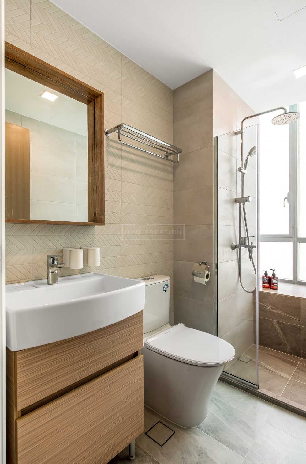 Minimalist Bathroom with Homogeneous Tiles and Herringbone Tiling