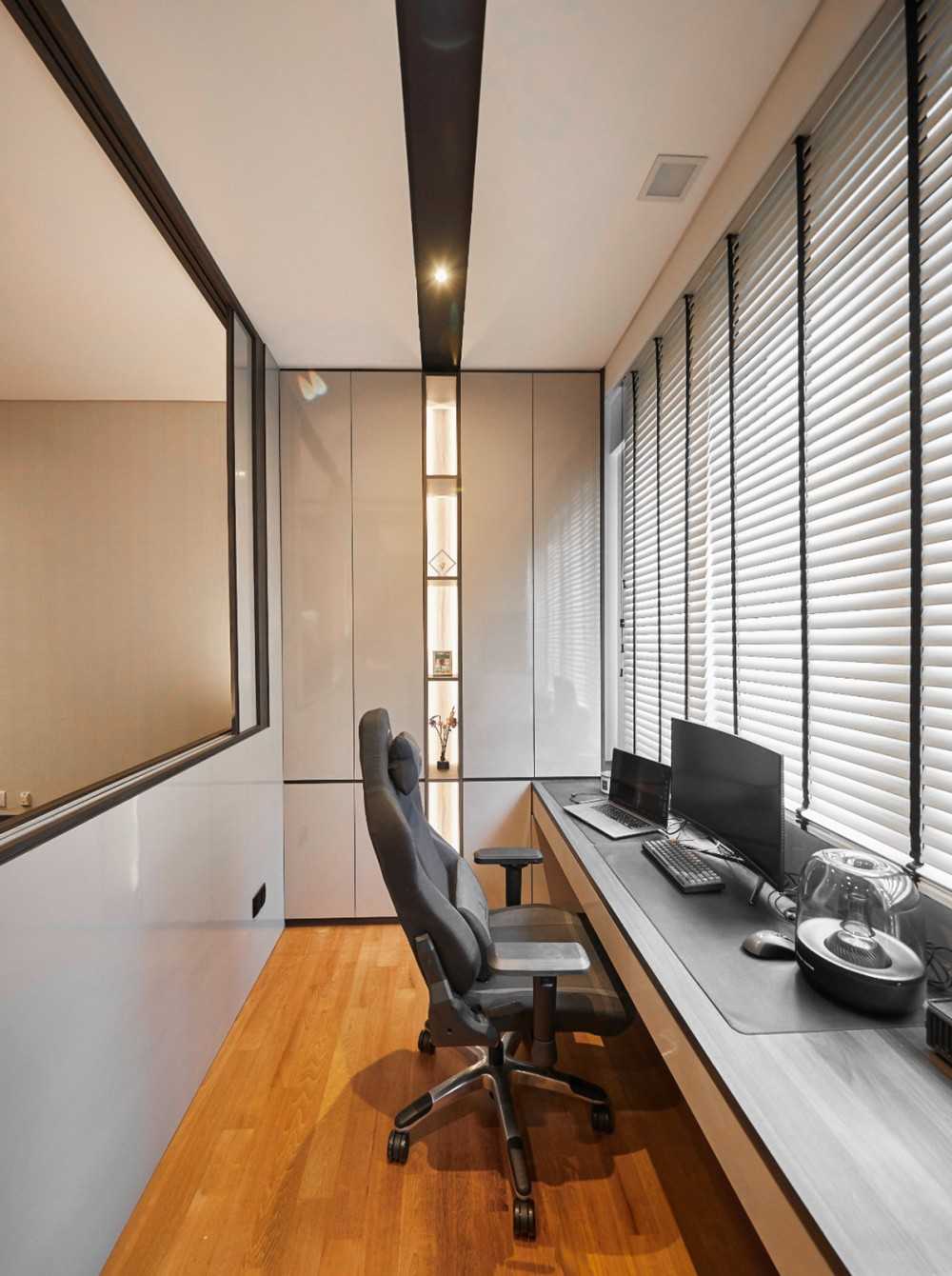Modern Study with Bookshelf and Window Shutters