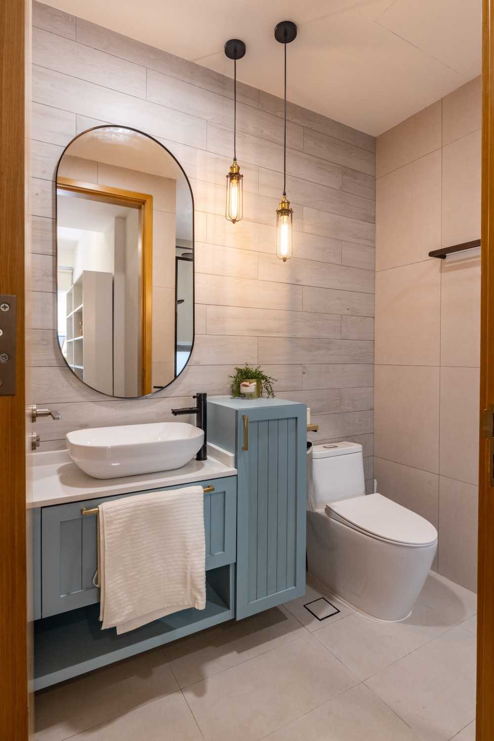 Country Bathroom with Drop Light and Mirror