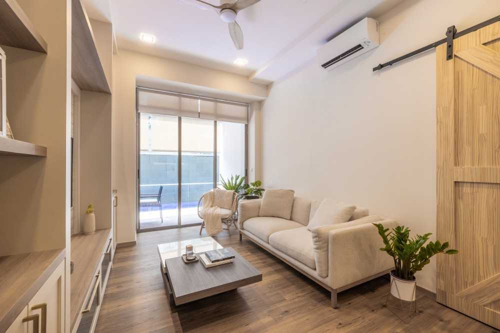 Country Living Room with Ceiling Fan and Sofa