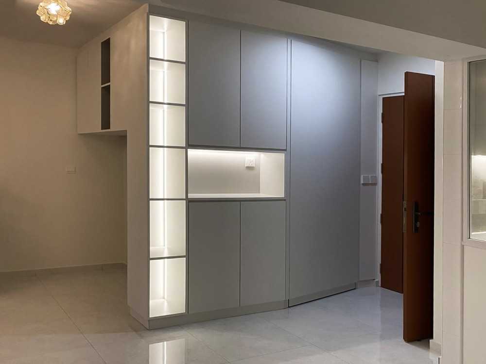 Scandinavian Foyer with Paintings and Storage Cabinets
