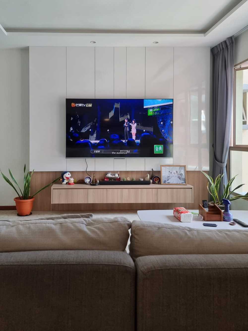 Scandinavian Living Room with TV Console and Feature Wall