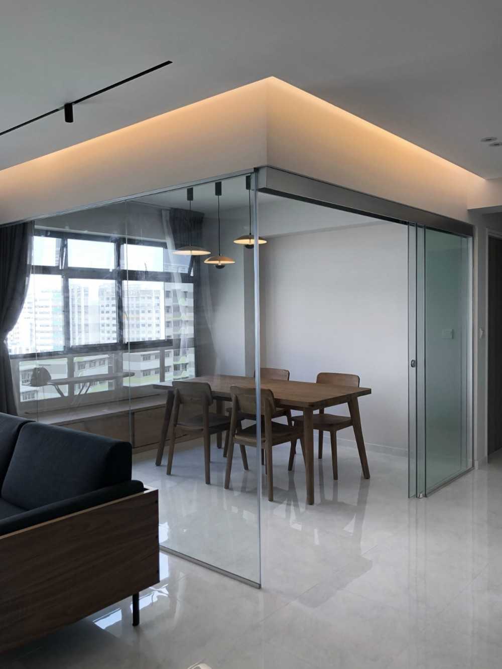 Scandinavian Dining Room with Glass Door and Window Seat