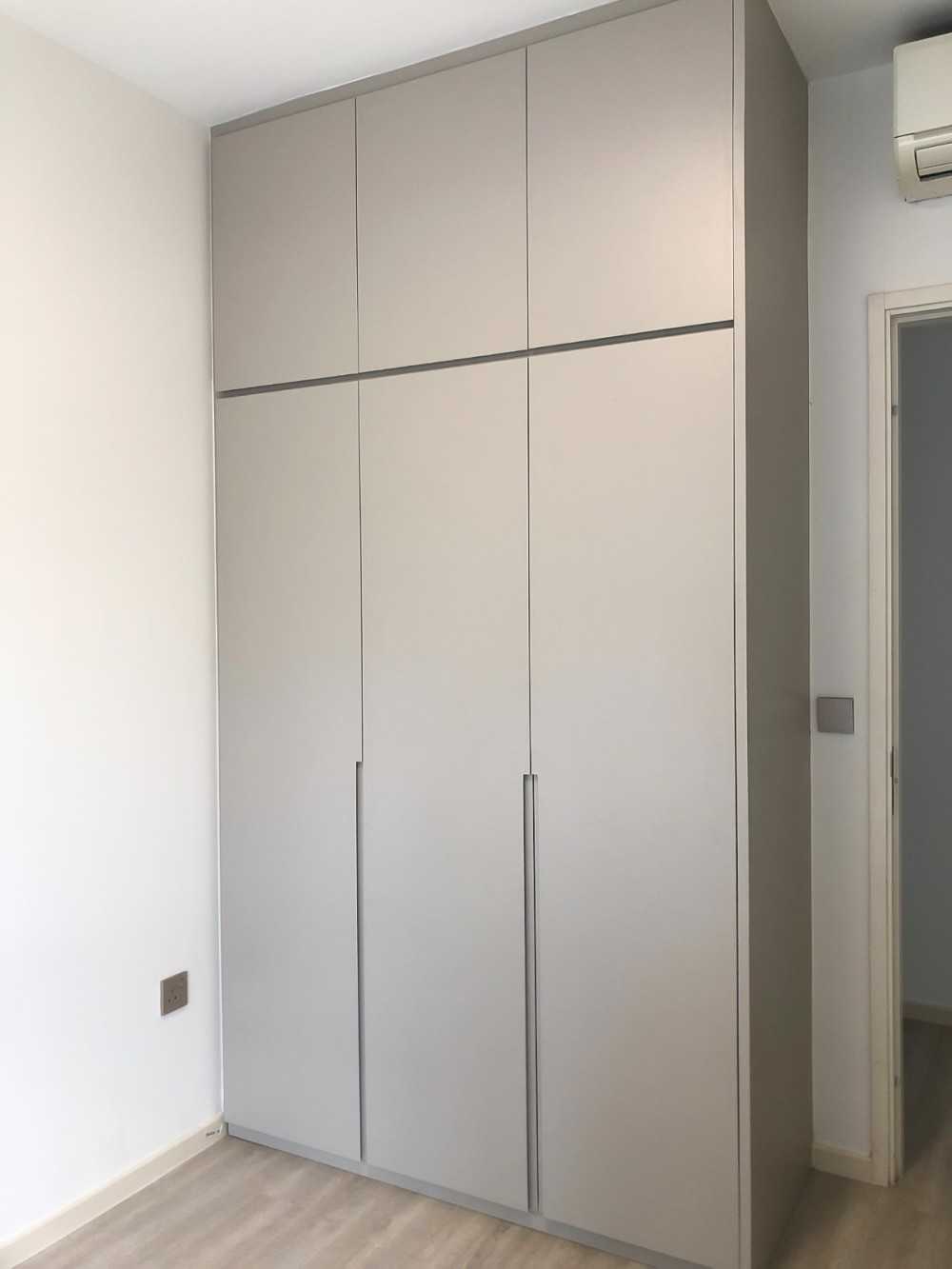 Scandinavian Bedroom with Wardrobe and Paintings