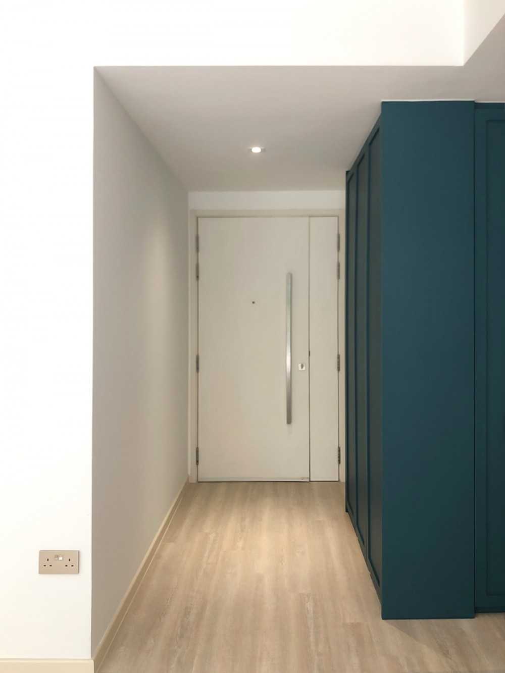 Scandinavian Foyer with Storage Cabinets and Display Cabinets