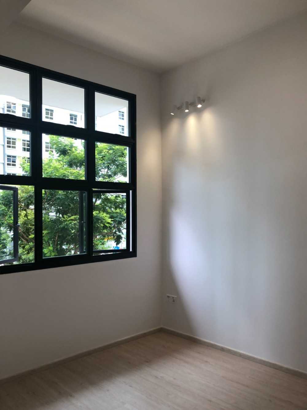 Scandinavian Bedroom with Window Grille and Paintings