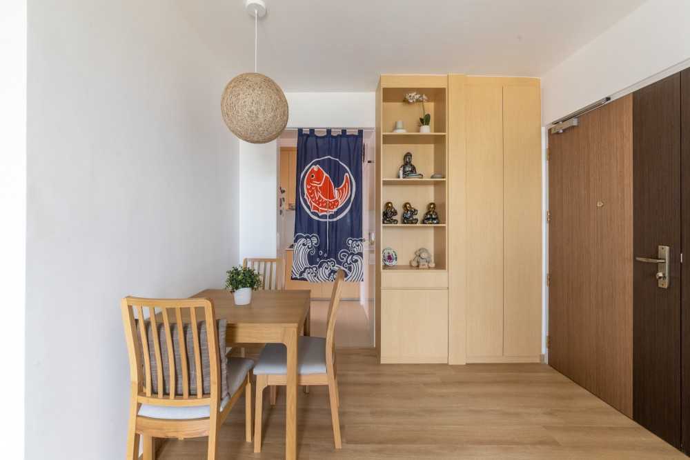 Asian Dining Room with Drop Light and Dining Table