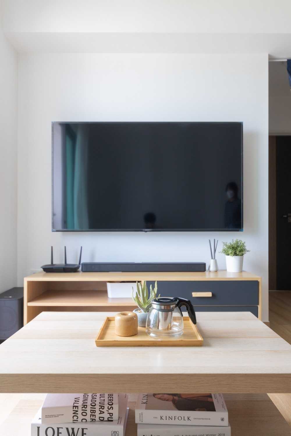 Asian Living Room with TV Console and Coffee Table