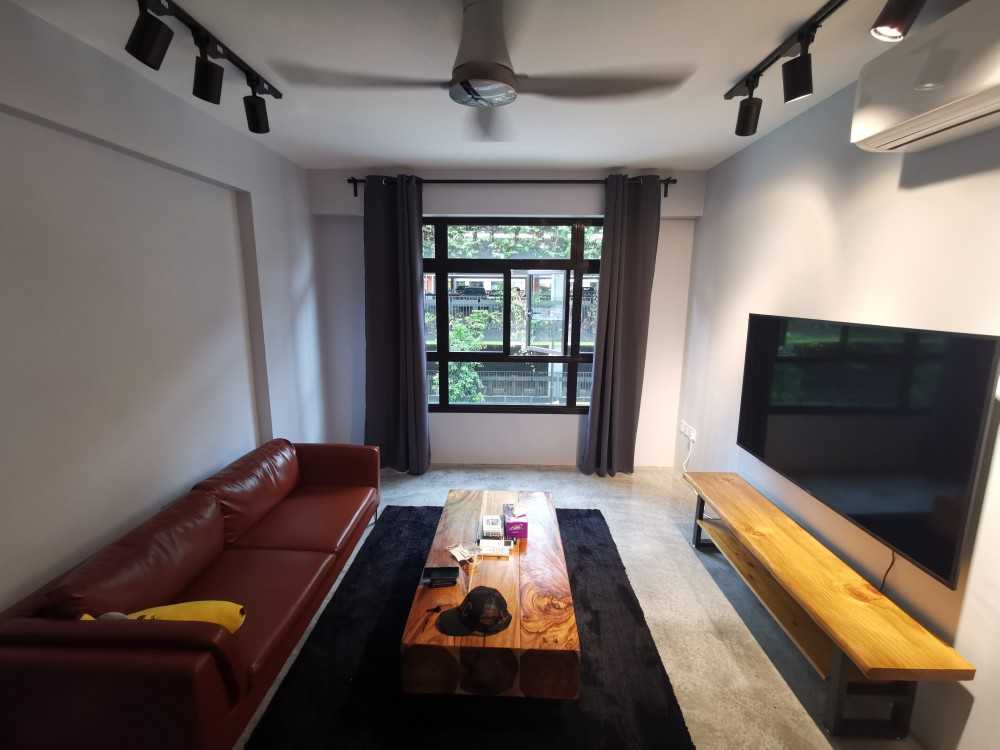 Industrial Living Room with Cement Floor and Sofa