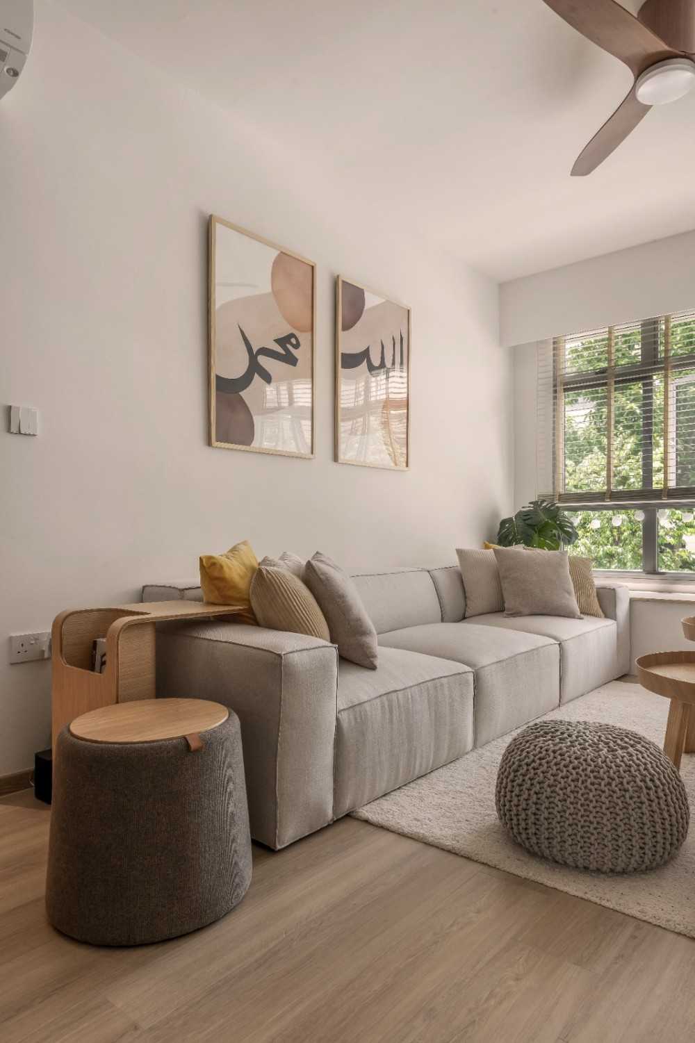 Scandinavian Living Room with Granite Floor and Drop Light