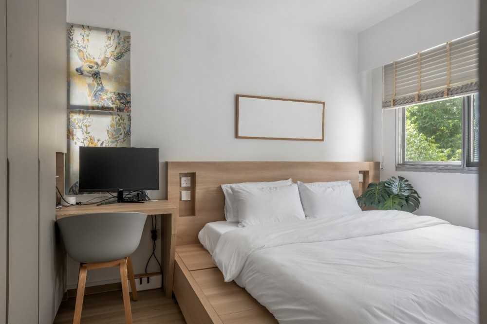 Scandinavian Bedroom with Marble Floor and Wood Flooring