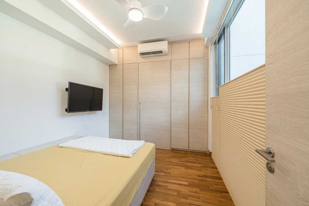 Modern Bedroom with Parquet Floor and Cove Lighting