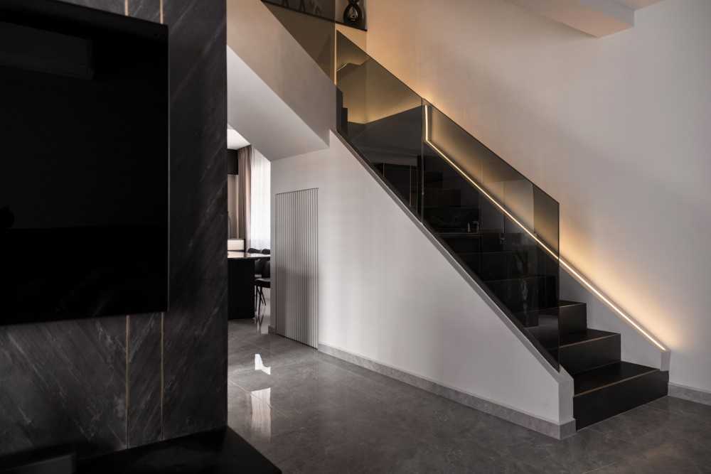Modern Entryway with Marble Floor and Staircase
