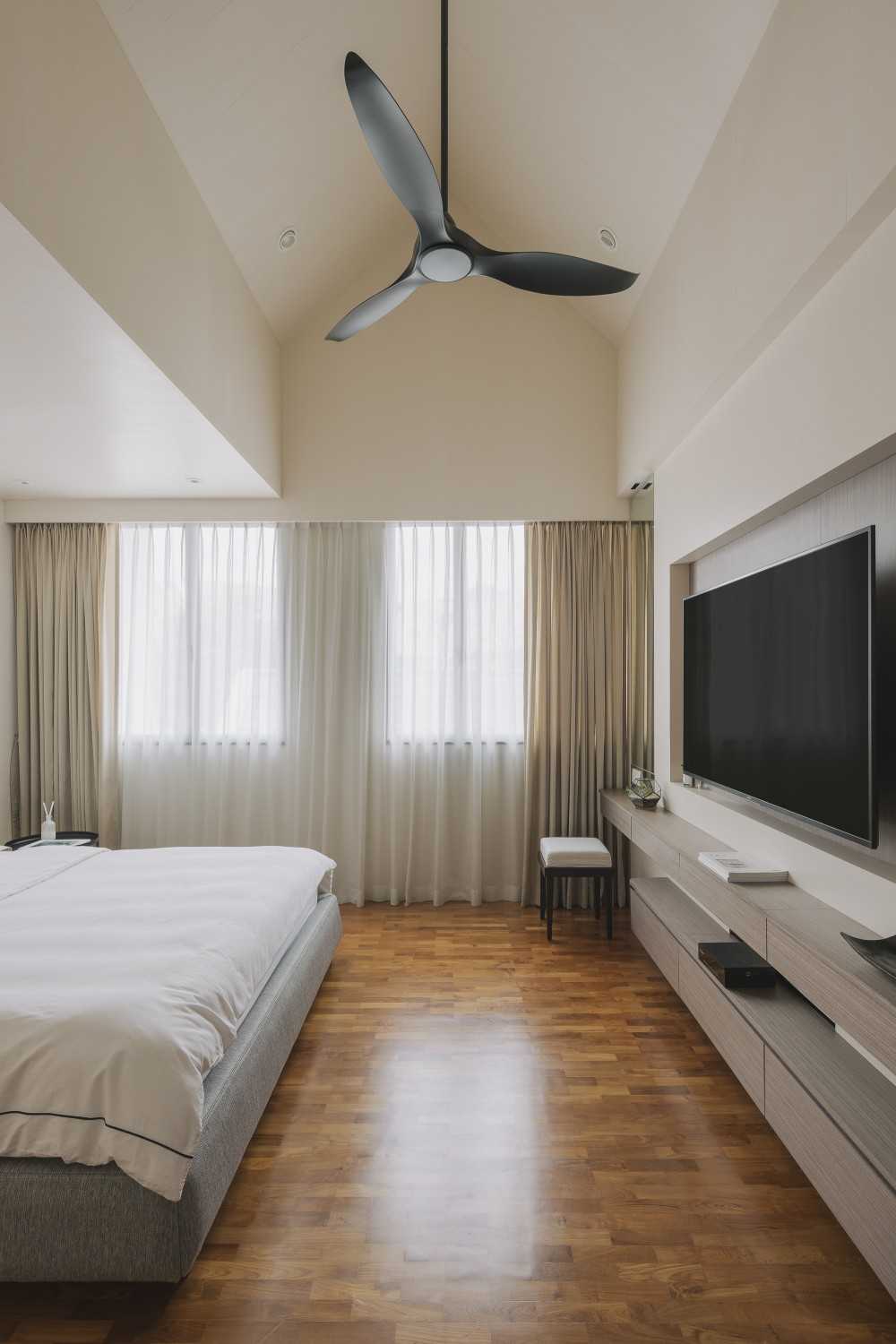 Modern Bedroom with TV Console and Ceiling Light