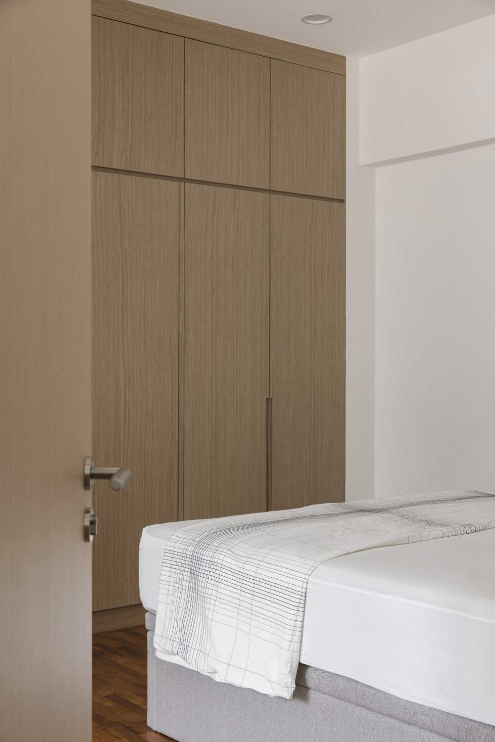 Modern Bedroom with Parquet Floor and Wardrobe