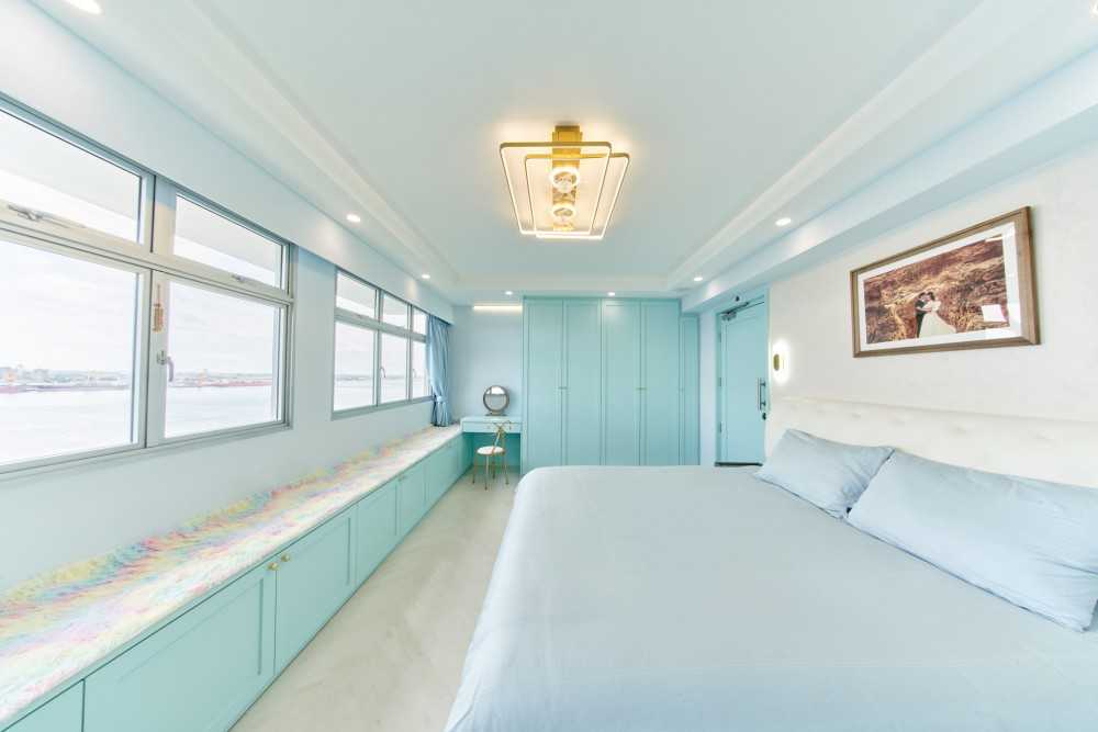 Scandinavian Bedroom with Bay Window and Wardrobe