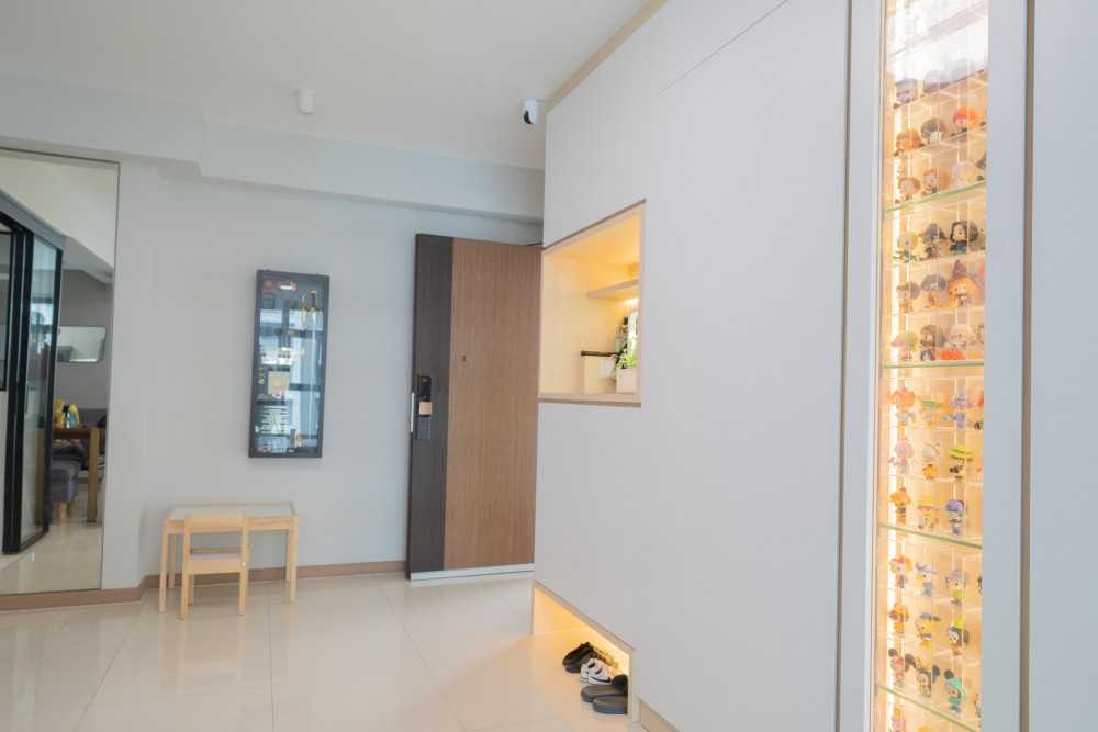 Scandinavian Entryway with Shelving Units and Display Cabinets
