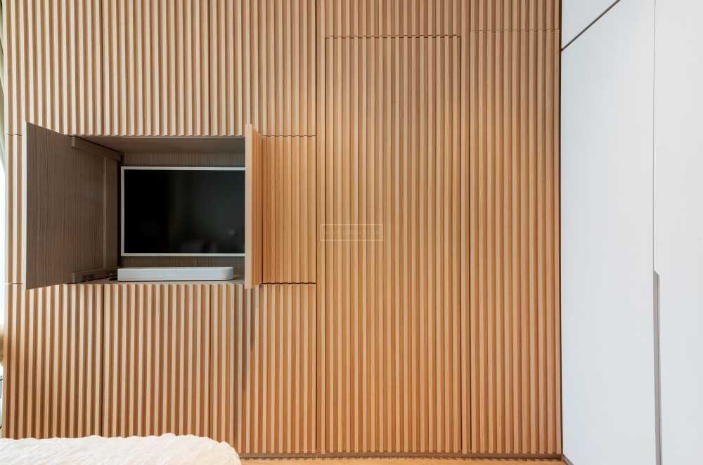 Modern Bedroom with Feature Wall and TV