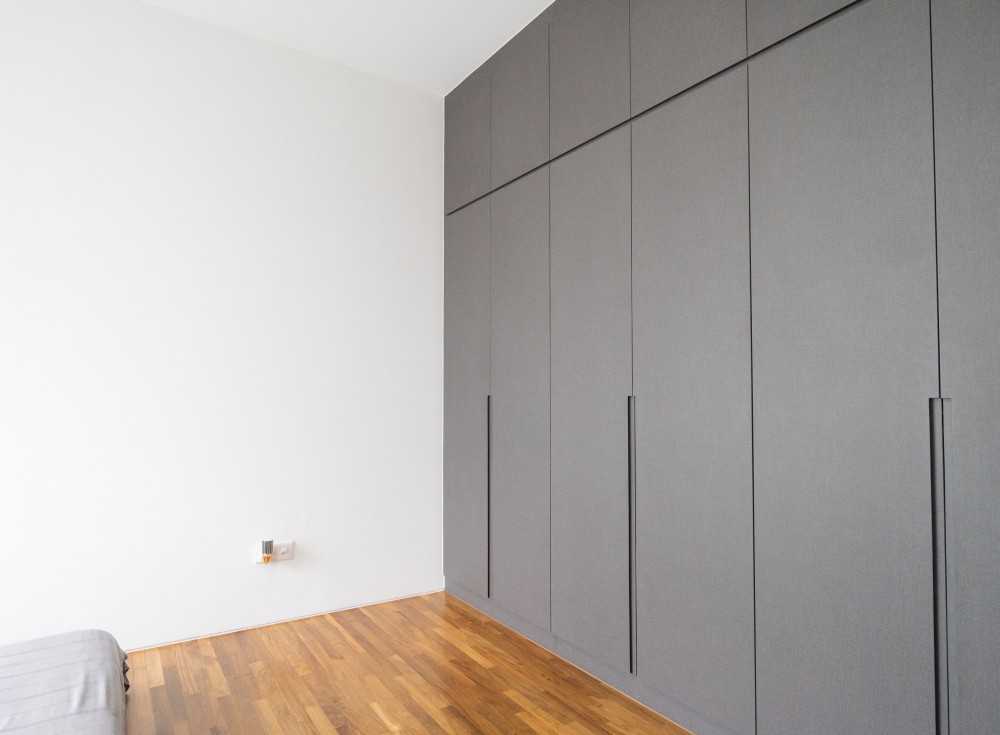 Modern Bedroom with Parquet Floor and Wardrobe