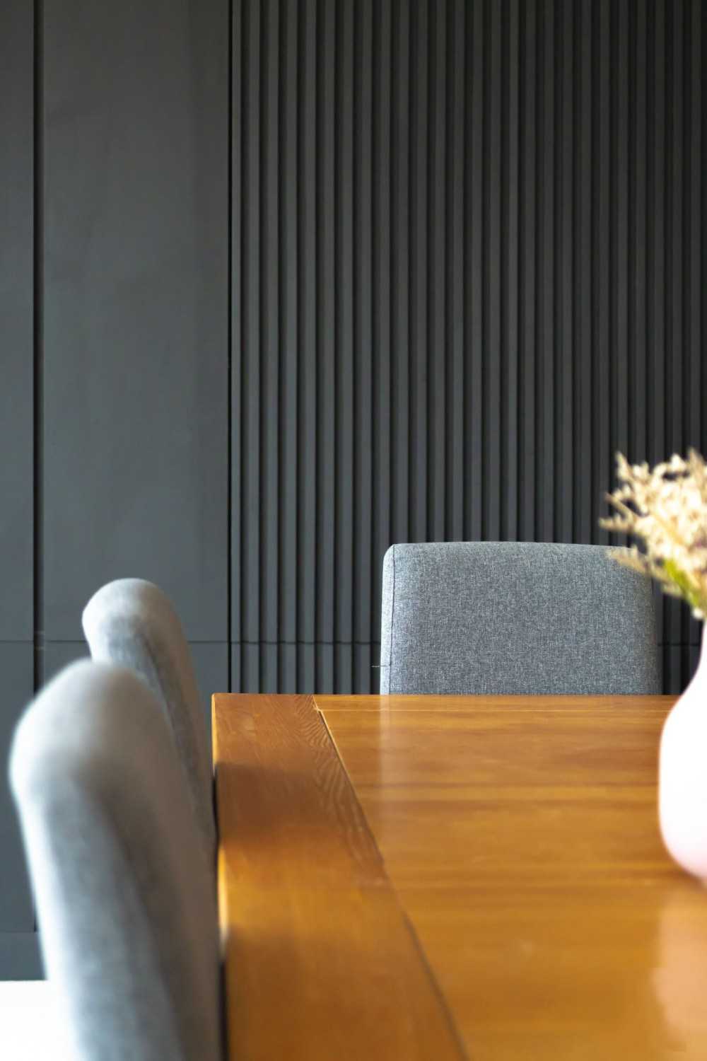 Modern Dining Room with Feature Wall and Storage Cabinets