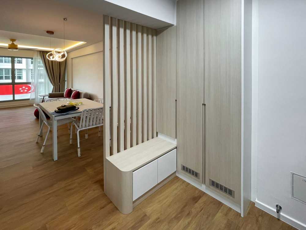 Scandinavian Foyer with Window Grille and Paintings