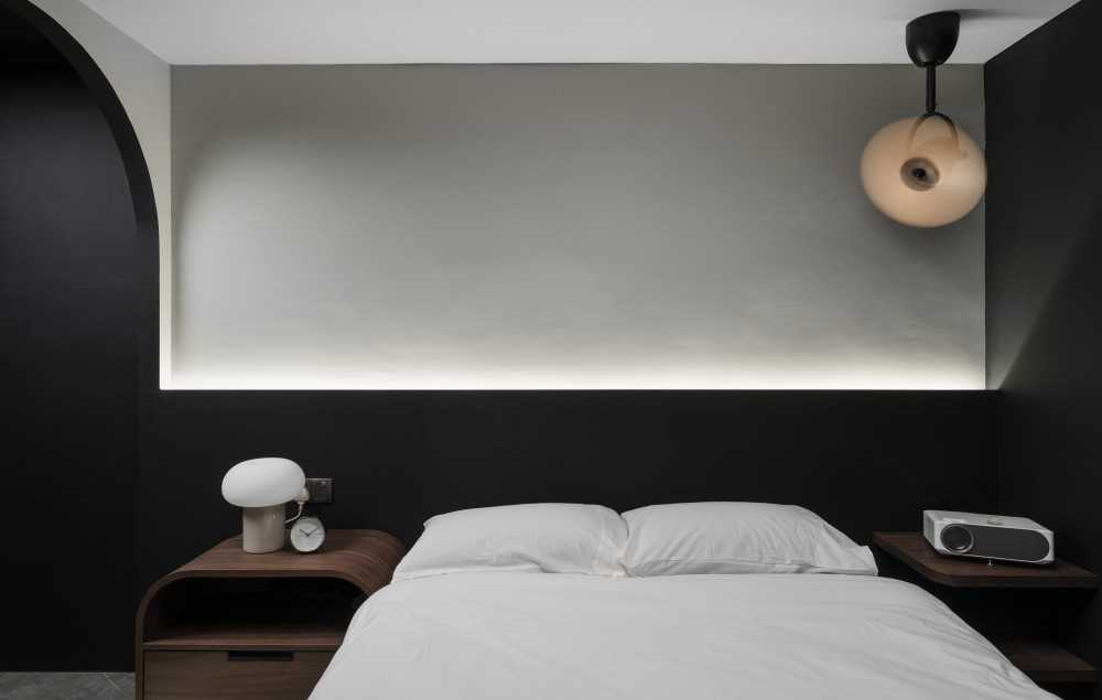 Contemporary Bedroom with Cove Lighting and Propeller Fan