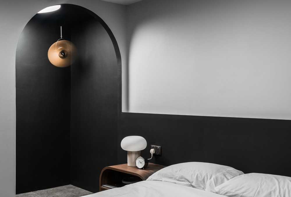 Contemporary Bedroom with Built-in Bed and Bedside Table