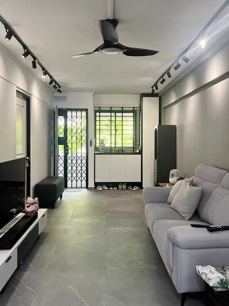 Modern Living Room with TV Console and Paintings