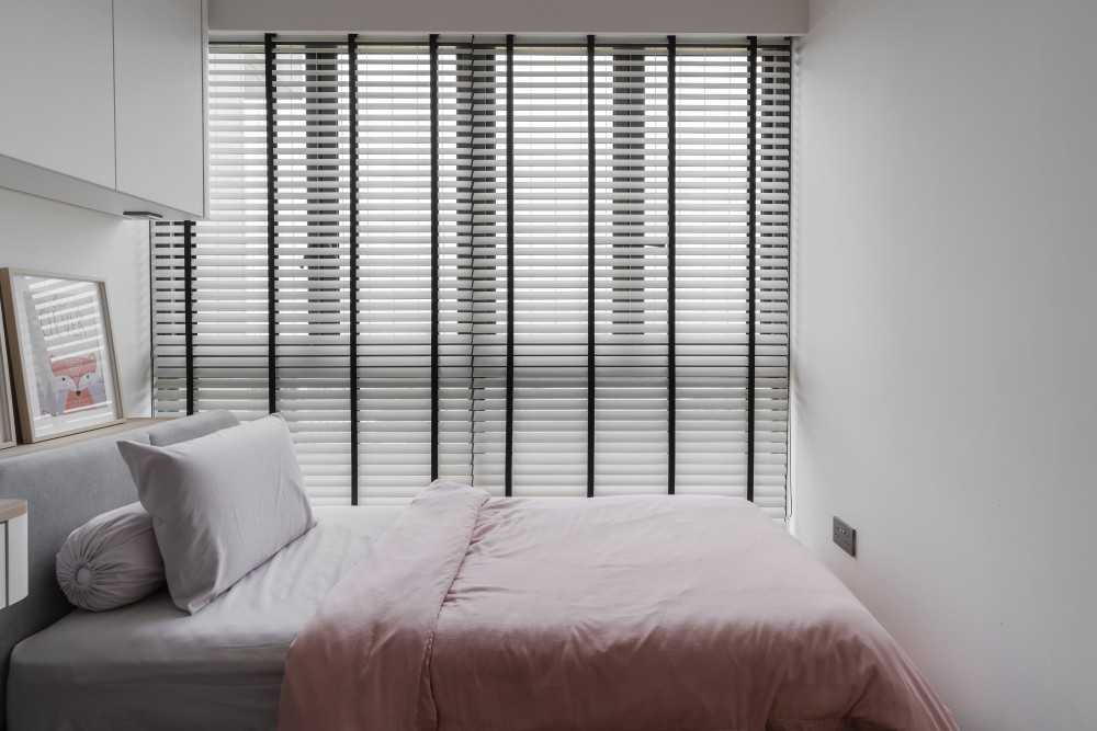 Scandinavian Bedroom with Storage Cabinets and Blinds