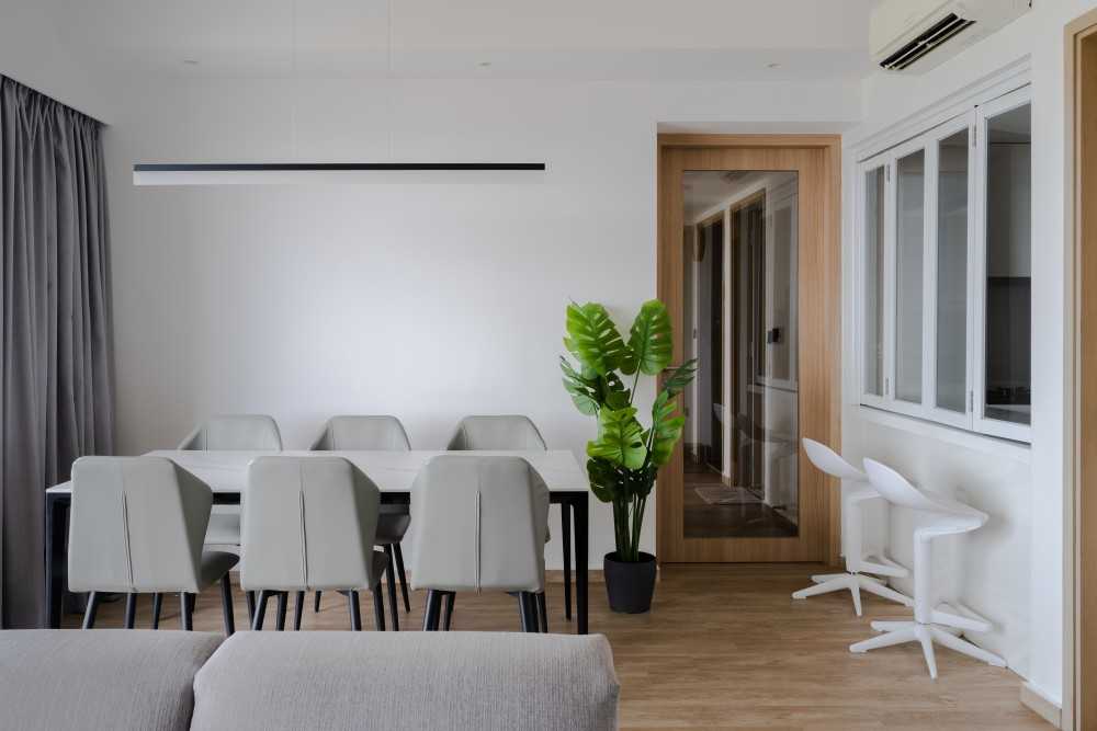 Scandinavian Dining Room with Kitchen Window and Dining Chairs
