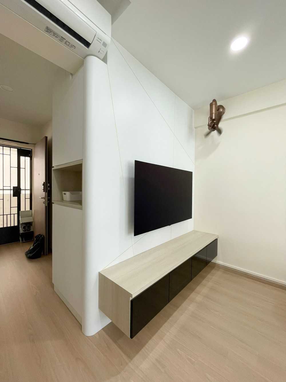 Scandinavian Living Room with TV Console and Paintings