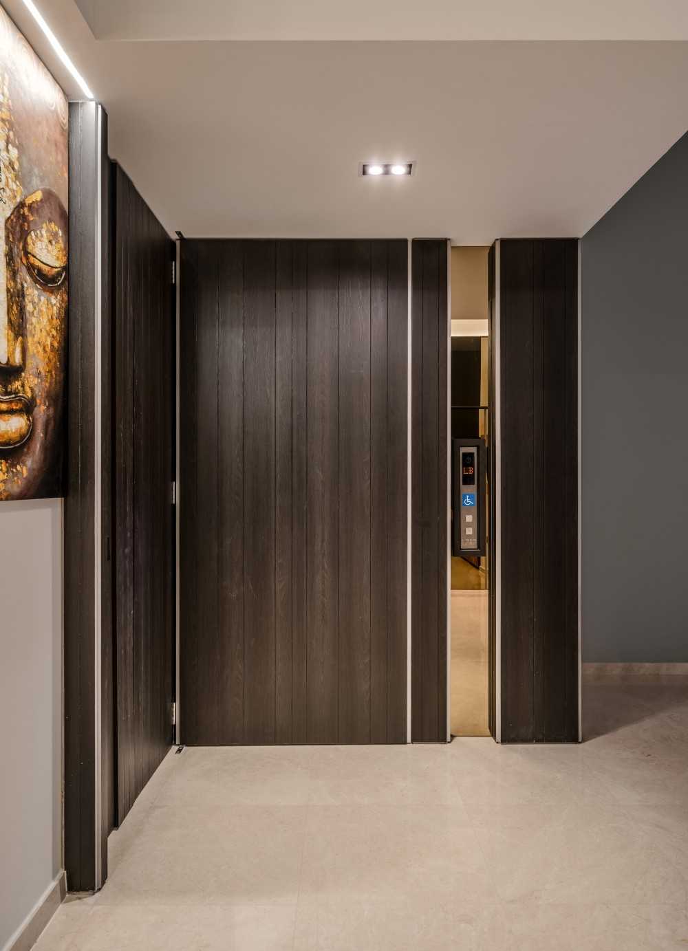Contemporary Foyer with Artwork and Console Table