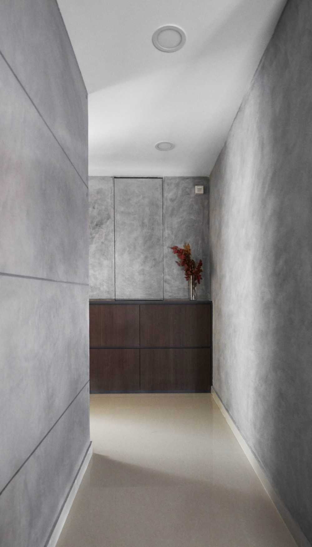Contemporary Entryway with Storage Cabinets and Houseplants