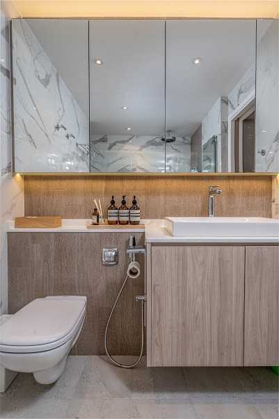 Scandinavian Bathroom with Homogeneous Tiles and Mirror