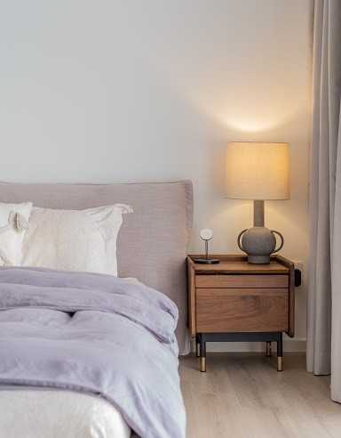 Scandinavian Bedroom with Vinyl Flooring and Bedside Table