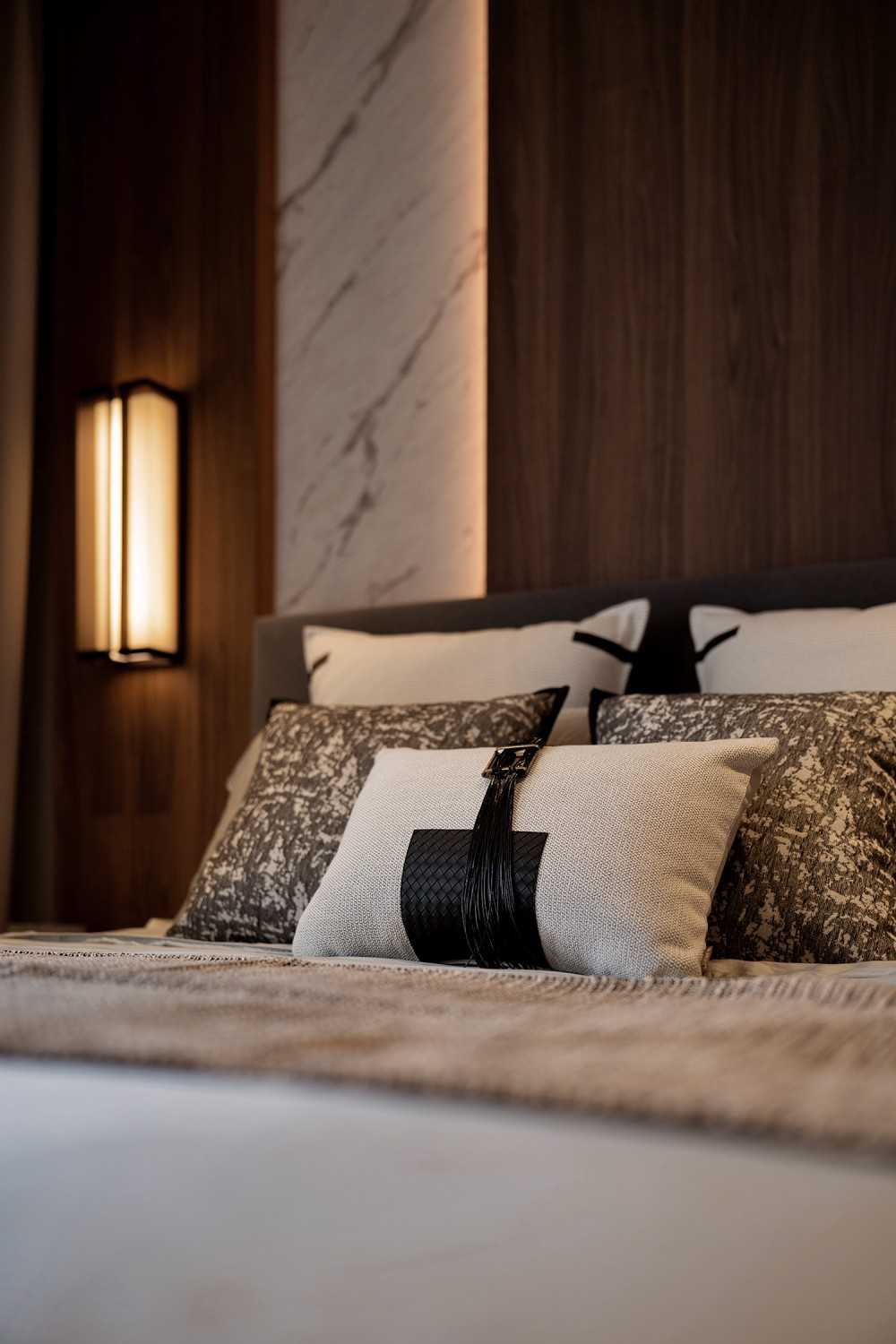 Contemporary Bedroom with Parquet Floor and Cove Lighting