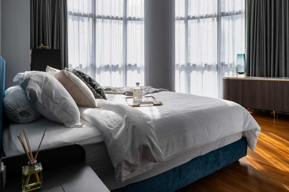 Modern Bedroom with Parquet Floor and Bedside Table