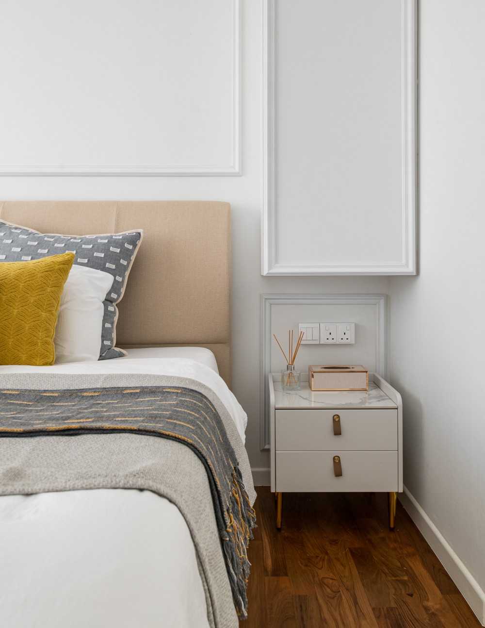 Modern Bedroom with Parquet Floor and Bedside Table