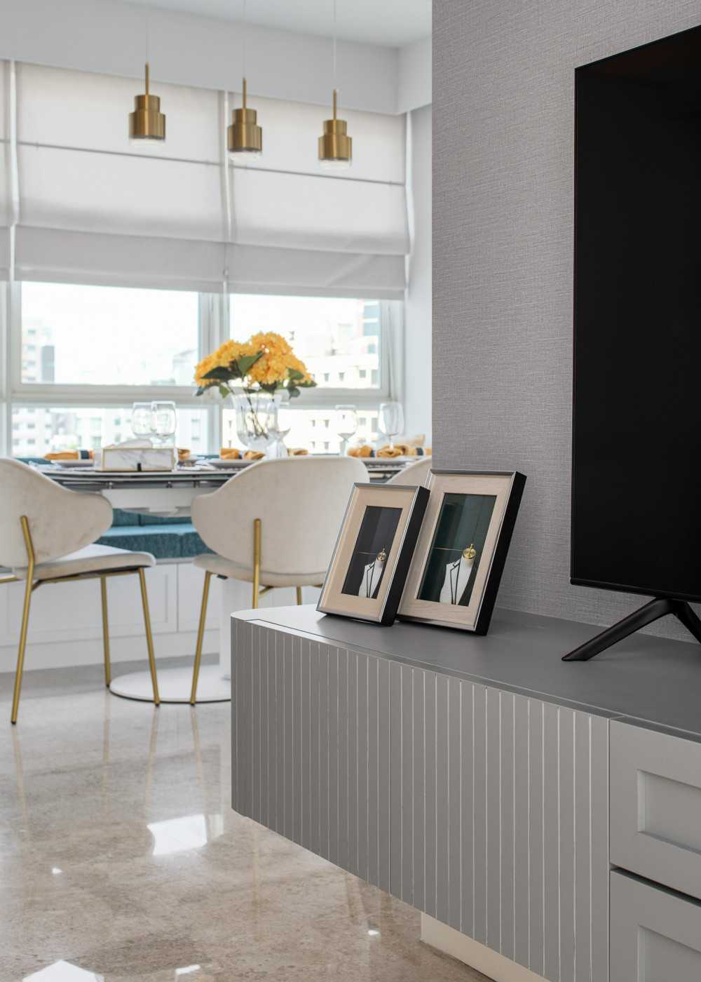Modern Living Room with TV Console and Cove Lighting
