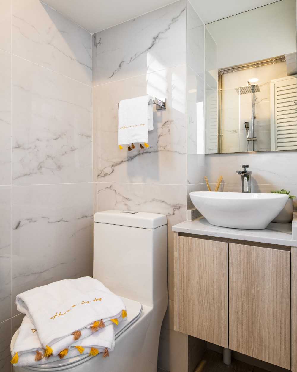 Scandinavian Bathroom with Countertop and Mirror