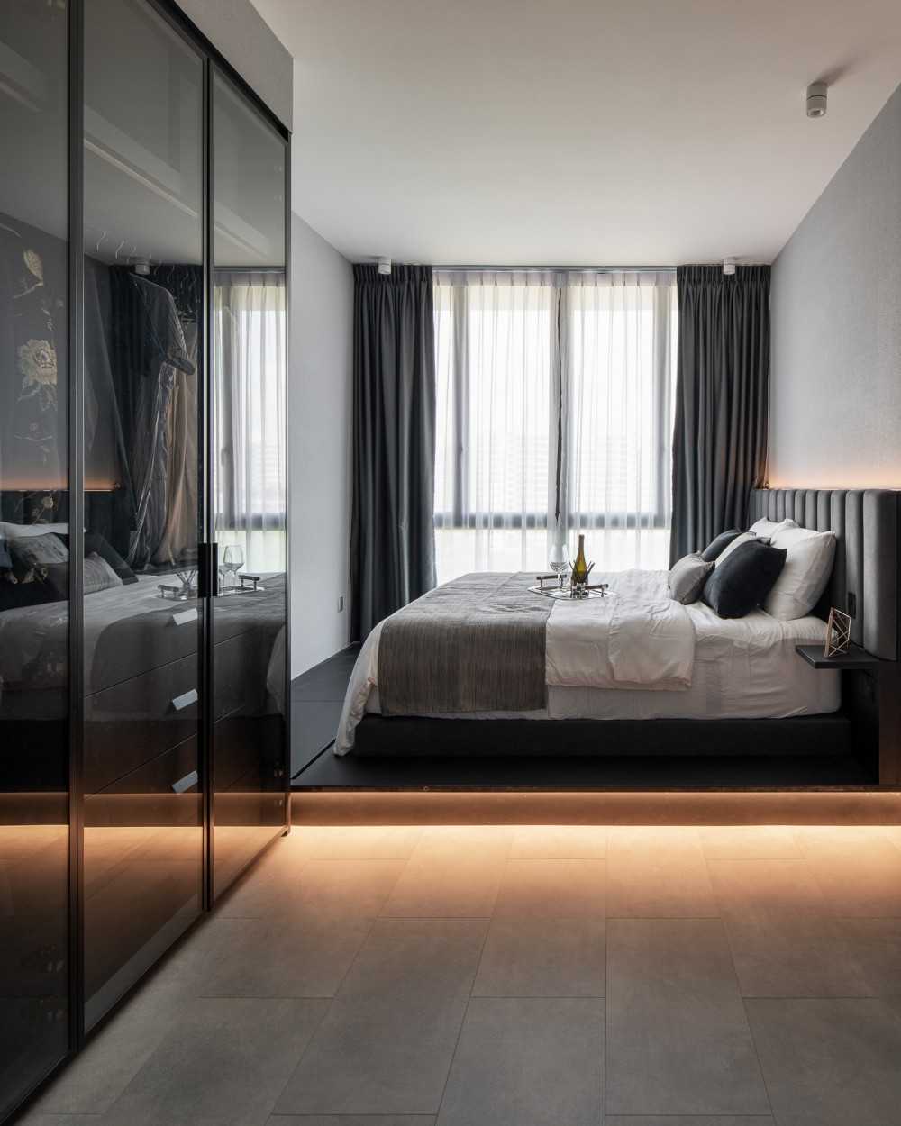 Modern Bedroom with Cove Lighting and Wardrobe