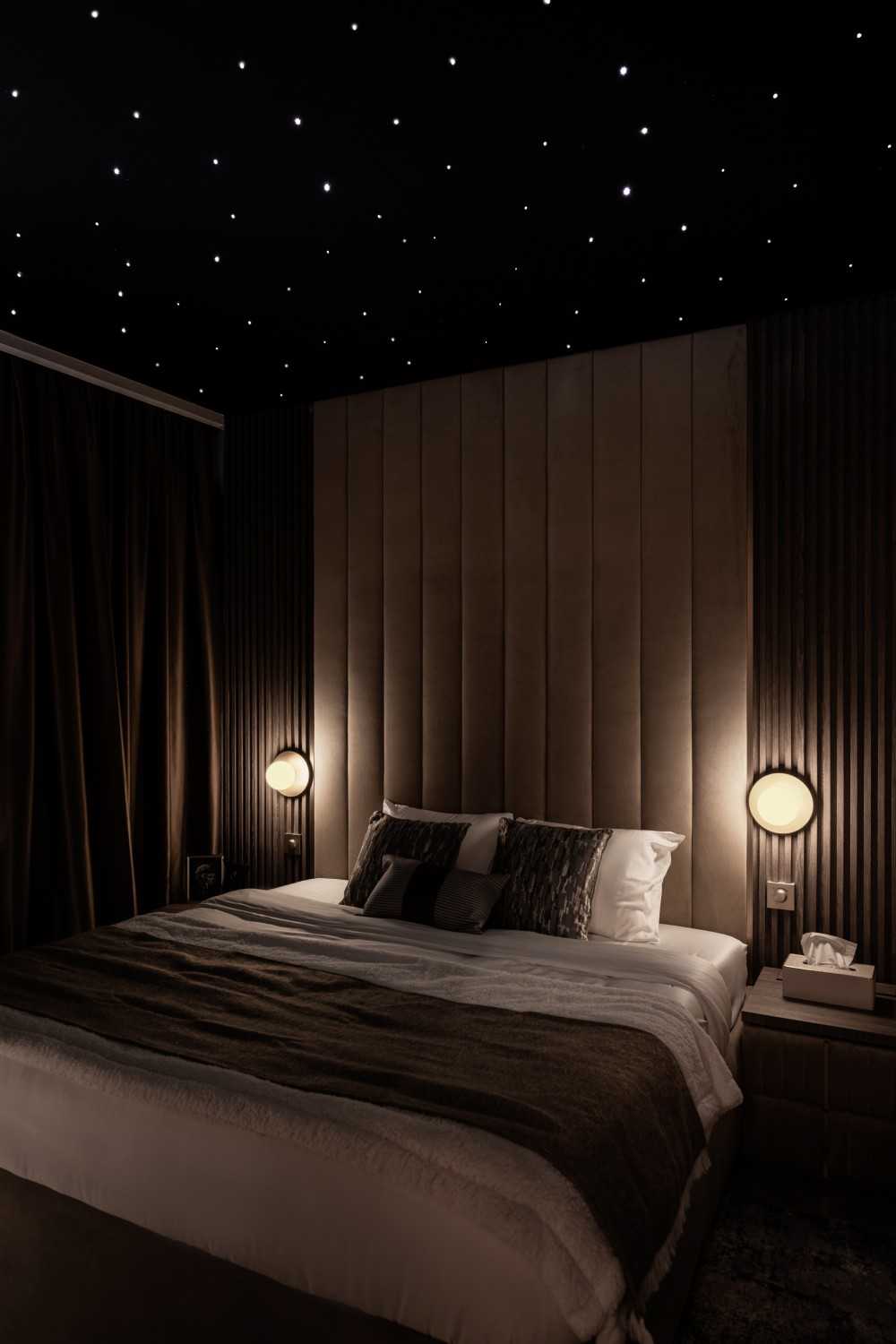 Modern Bedroom with Cove Lighting and Built-in Bed