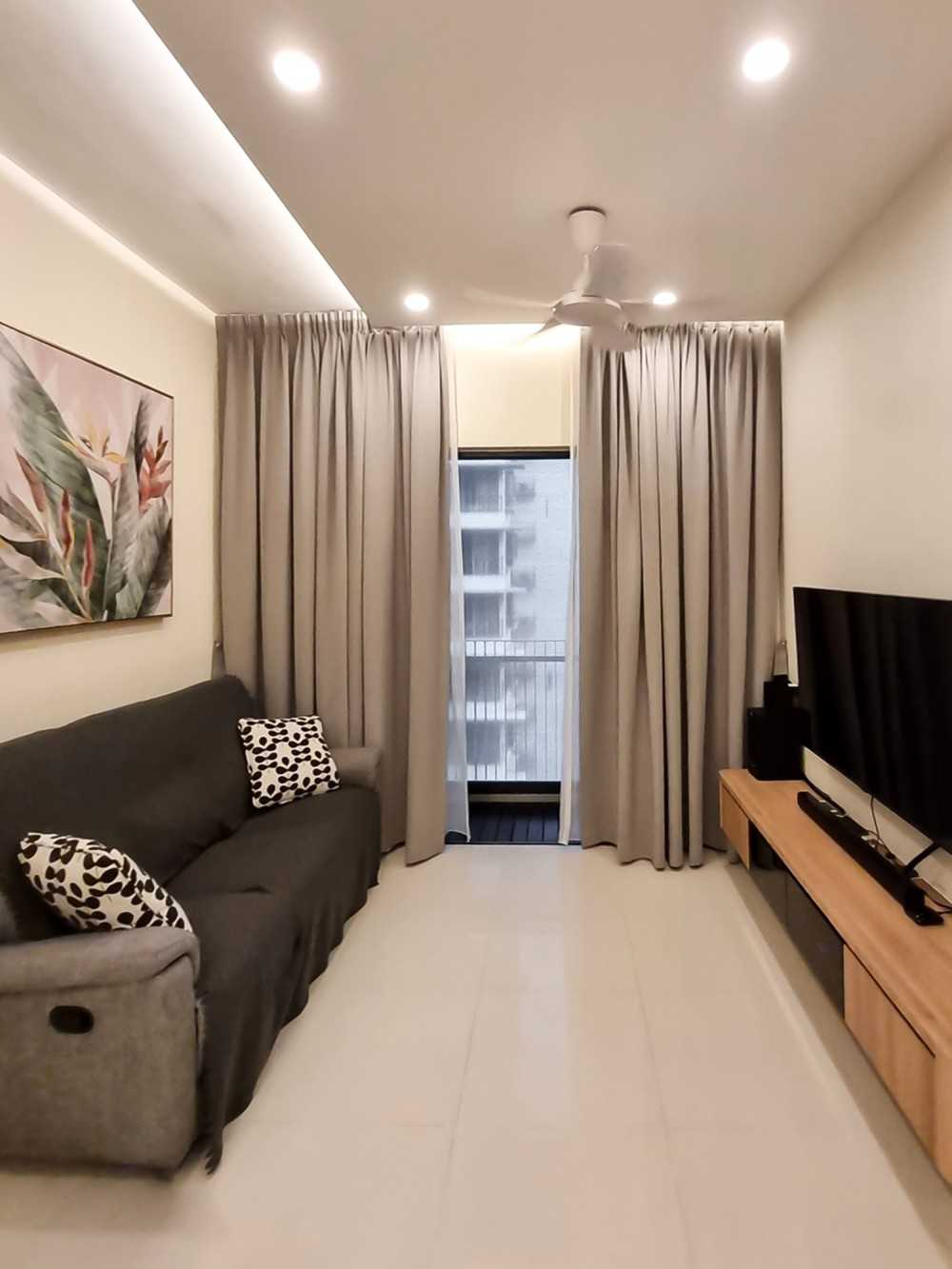 Scandinavian Living Room with TV Console and Window Grille