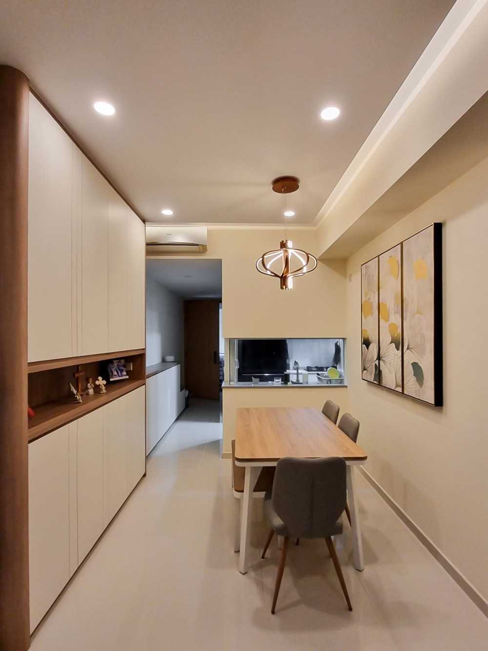 Scandinavian Dining Room with Sideboard and Paintings