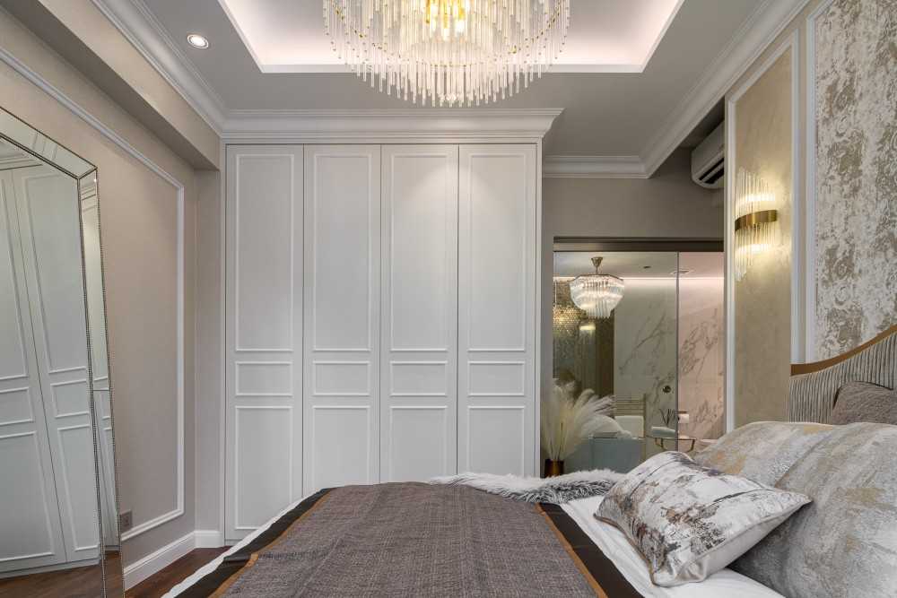 Modern Bedroom with Wardrobe and Chandelier