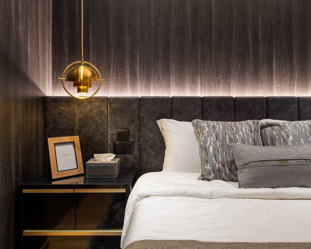 Modern Bedroom with Cove Lighting and Bedside Table