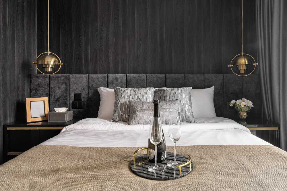 Modern Bedroom with Cove Lighting and Built-in Bed